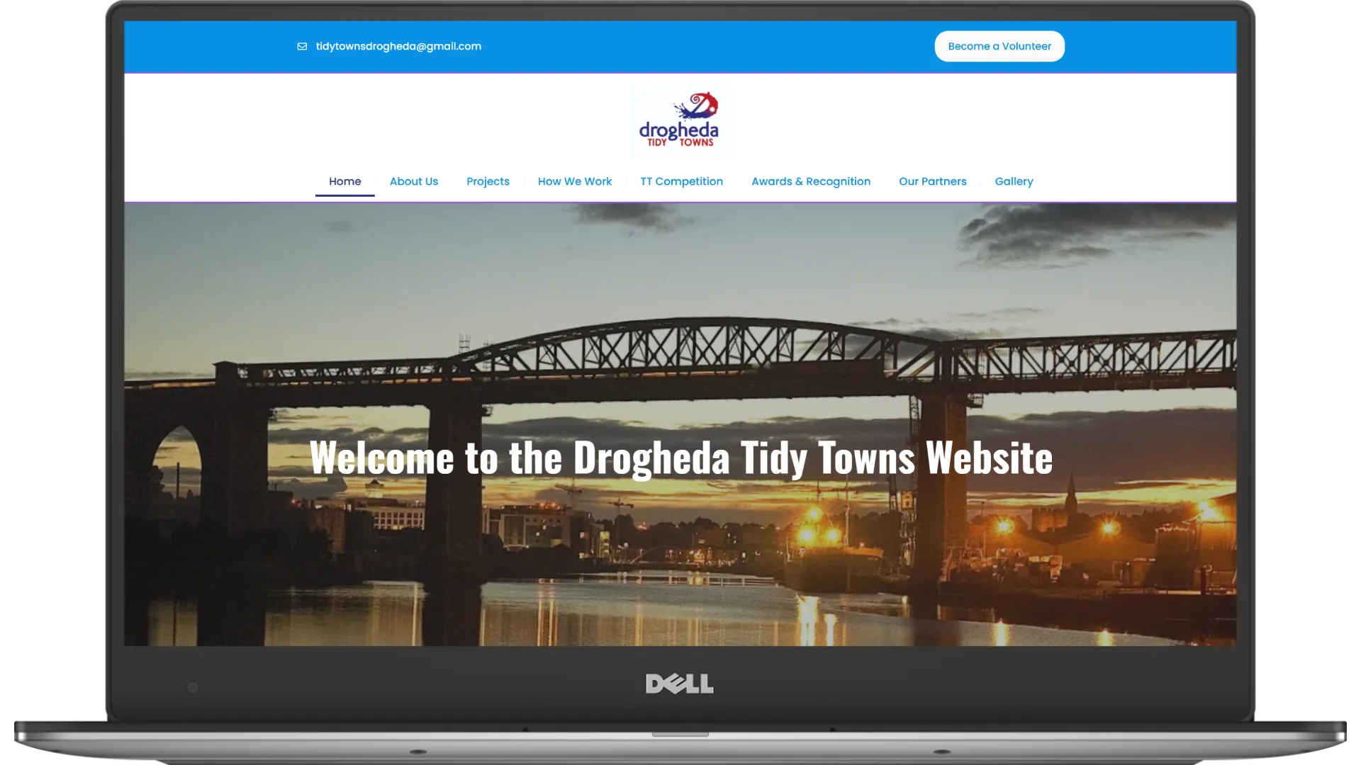 Drogheda Tide Towns website homepage shown on a laptop