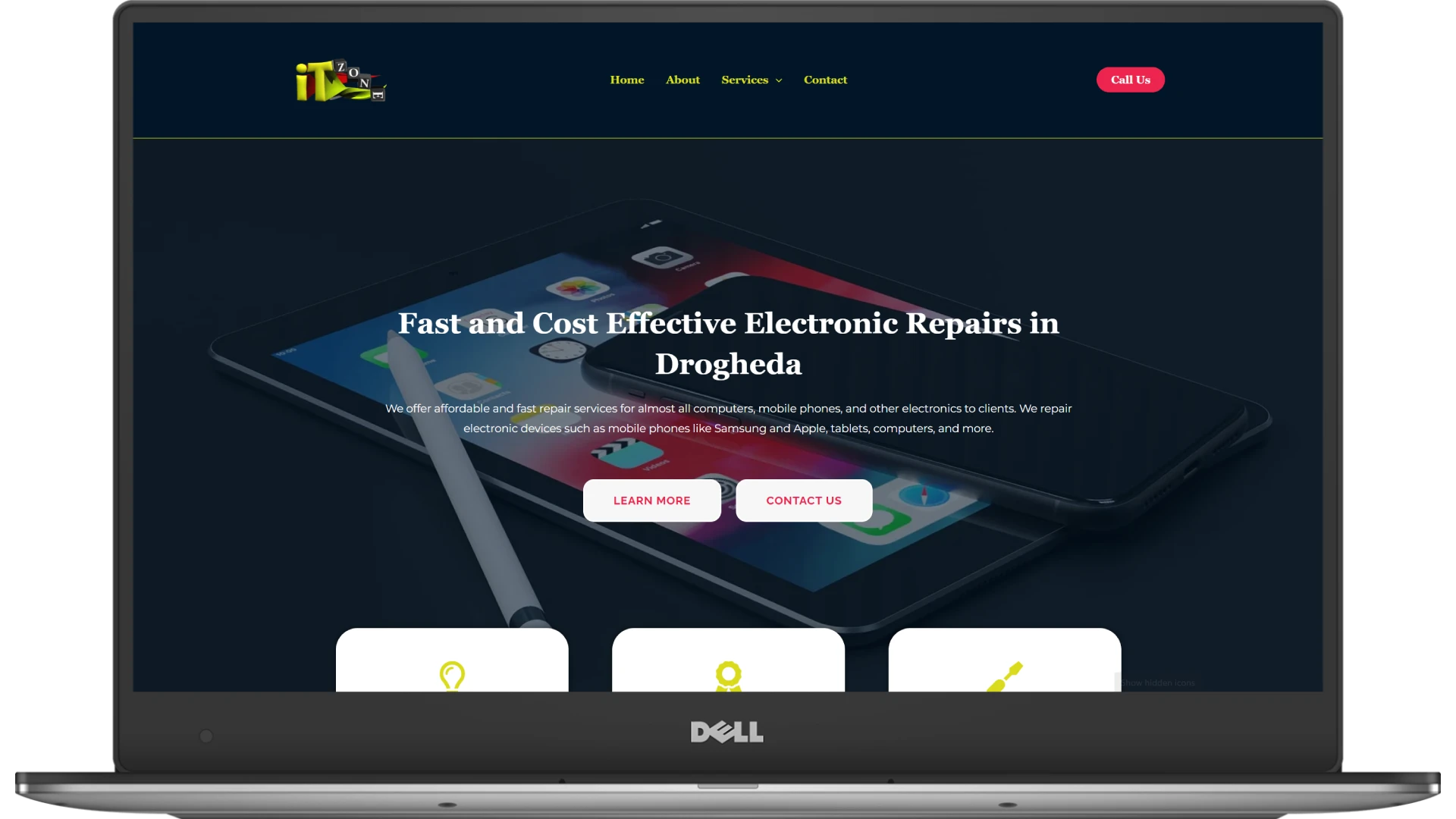 IT Zone website homepage shown on a laptop