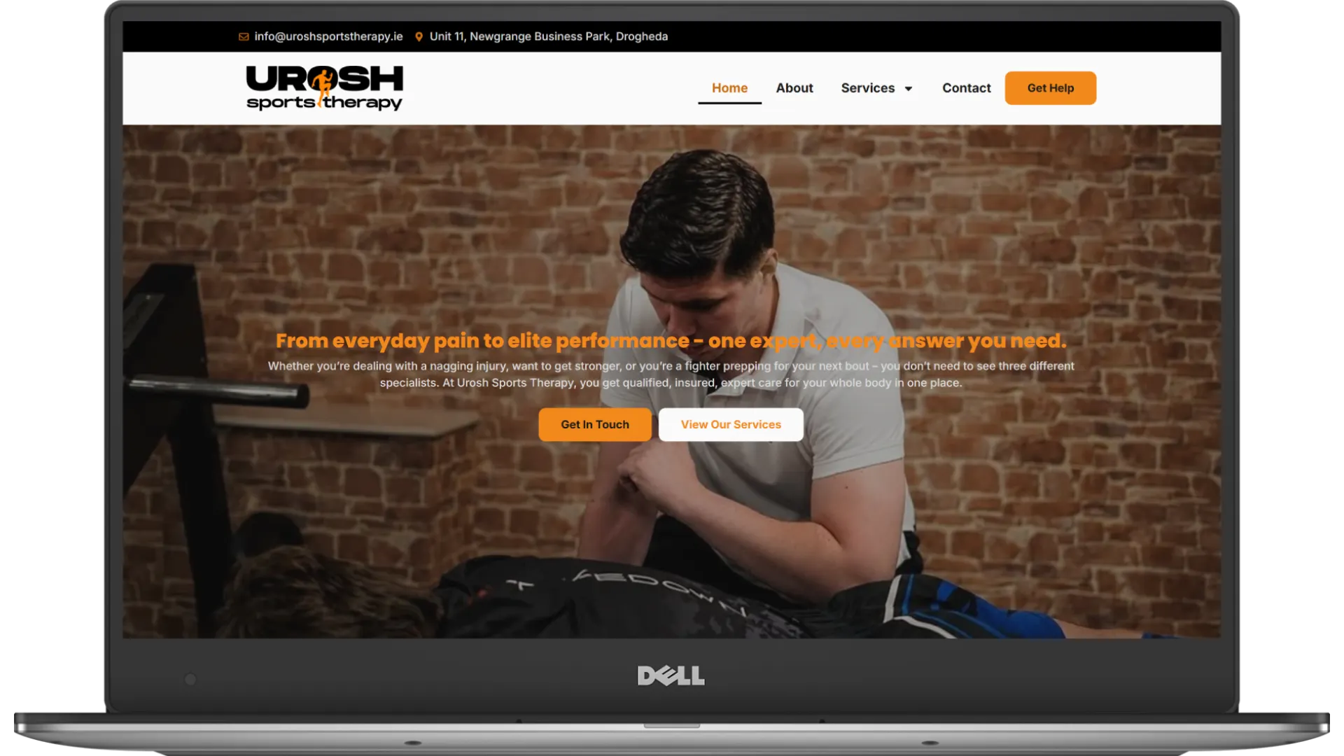 Urosh Sports Therapy website homepage shown on a laptop
