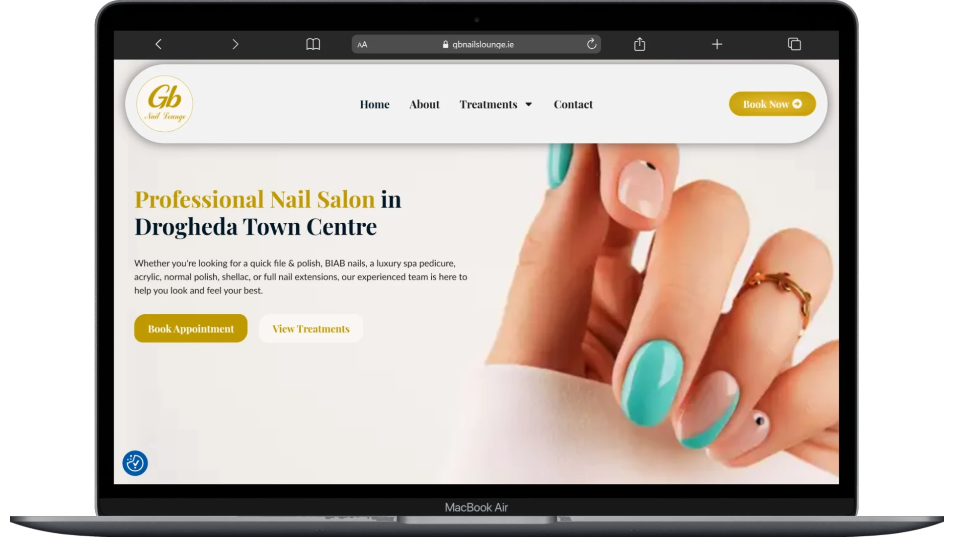 GB Nails Lounge website homepage shown on a laptop