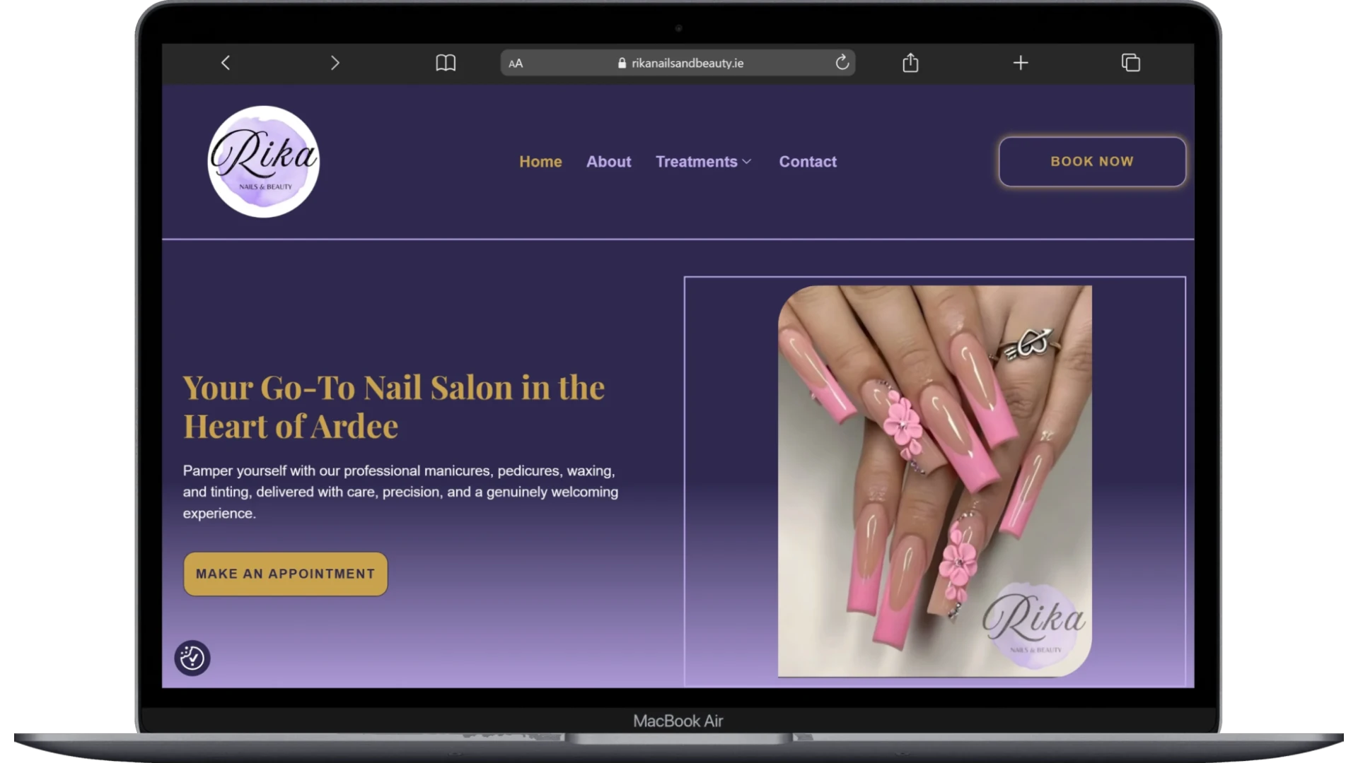 Rikas Nails and Beauty website homepage shown on a laptop